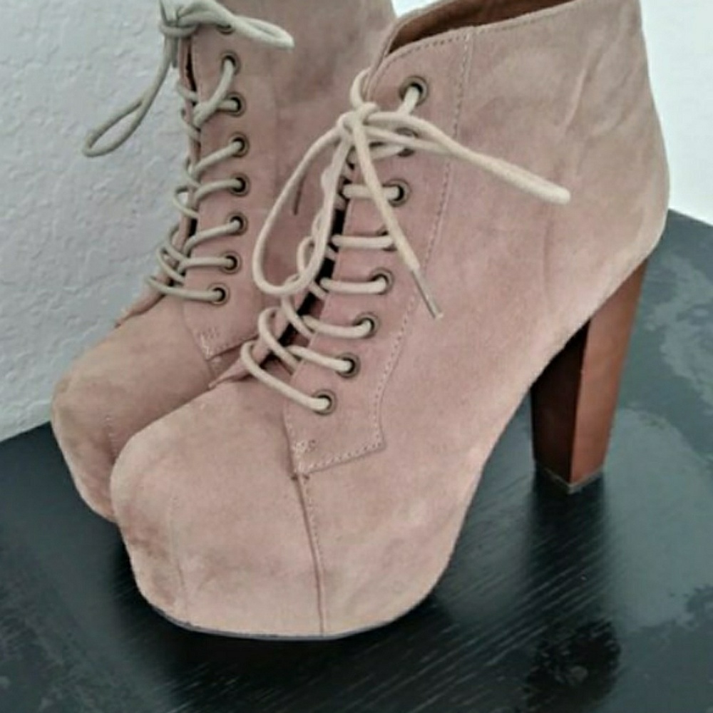 Tan Suede material heel booties.